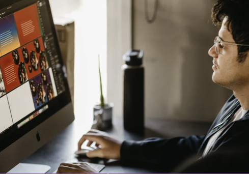 A person using a desktop computer